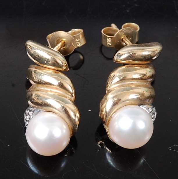 Lot 2629 - A pair of 9ct yellow gold, pearl and diamond...