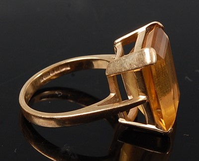 Lot 2578 - A yellow gold citrine single stone ring,...