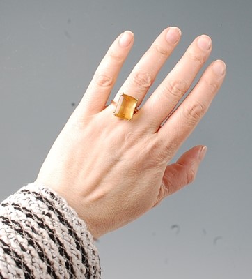 Lot 2578 - A yellow gold citrine single stone ring,...