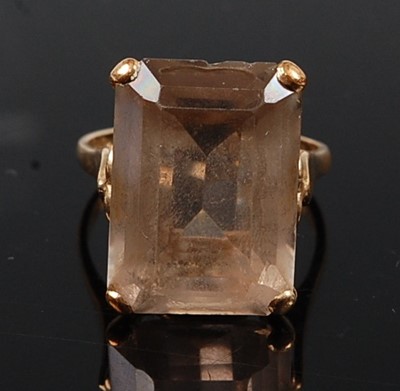 Lot 2579 - A 9ct yellow gold topaz single stone ring,...