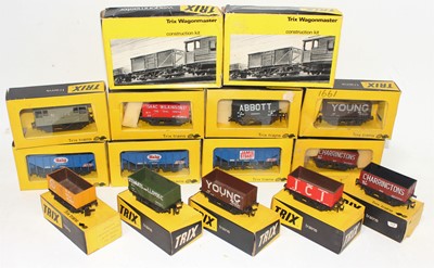 Lot 587 - Fifteen Trix wagons in yellow/black boxes:...
