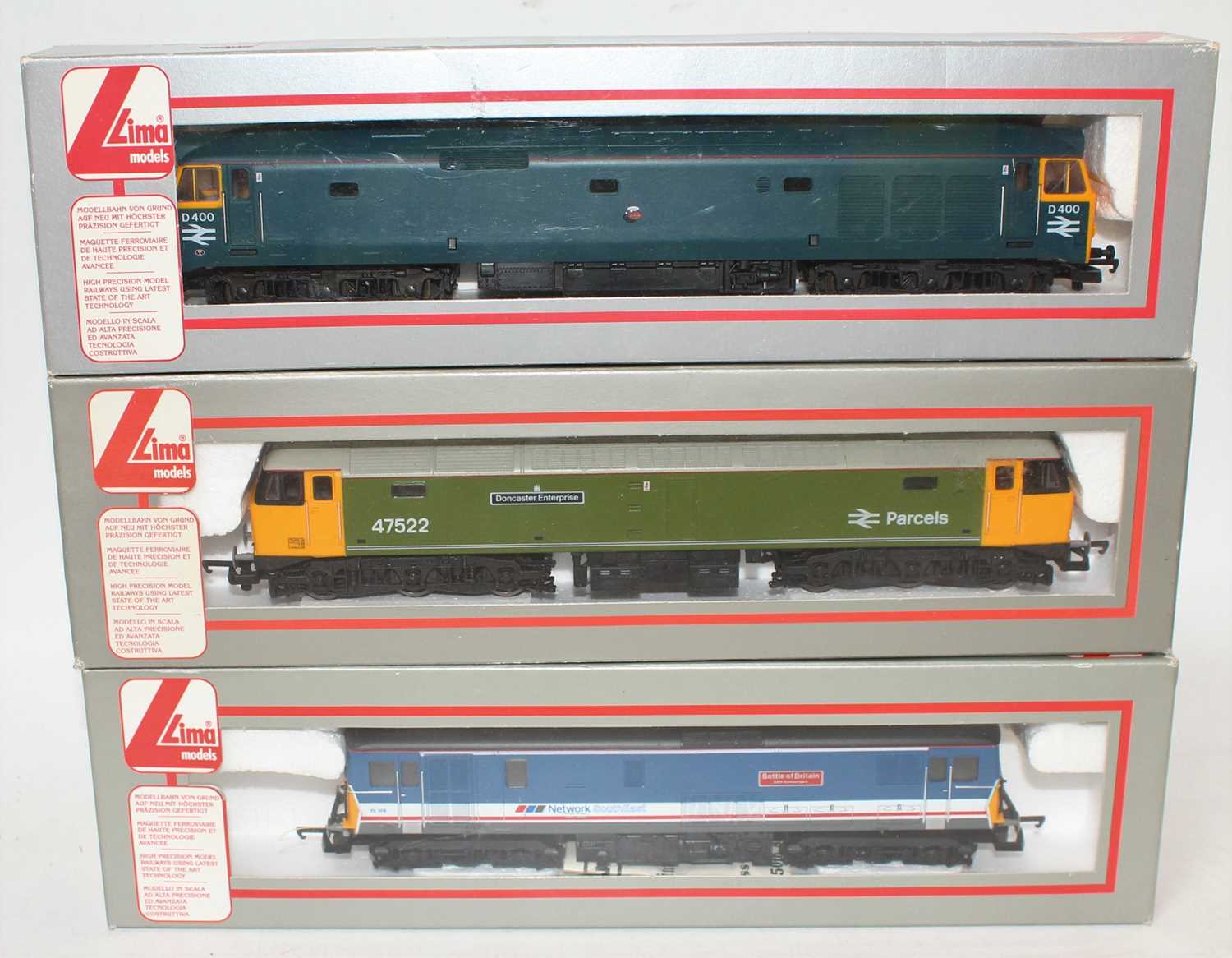 Lot 471 - Three various boxed as issued Lima 00 gauge...
