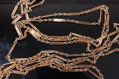 Lot 2590 - A yellow metal long guard chain, with...