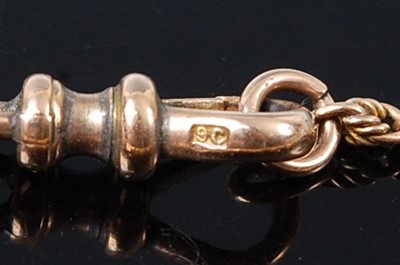 Lot 2590 - A yellow metal long guard chain, with...