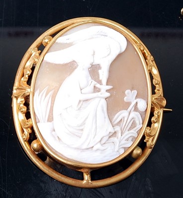 Lot 2592 - Two yellow metal large shell cameo brooches,...