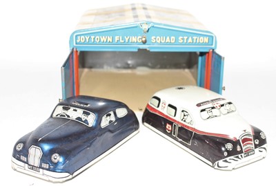 Lot 865 - A Mettoy Joytown Flying Squad tinplate police...