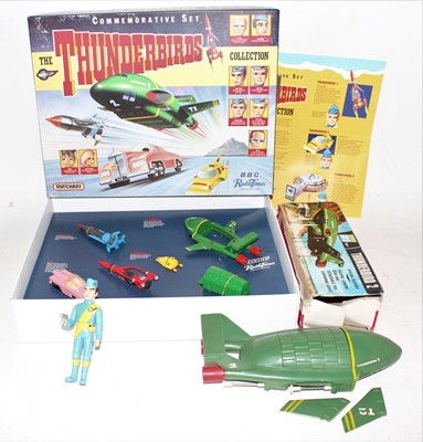 Lot 2540 - A collection of Thunderbirds related gift sets,...