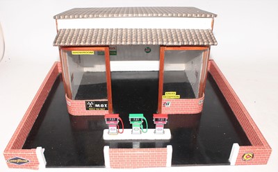 Lot 1246 - A wooden scratch built model of a garage and...