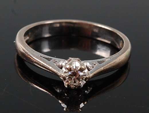 Lot 2603 - An 18ct white gold diamond single stone ring,...