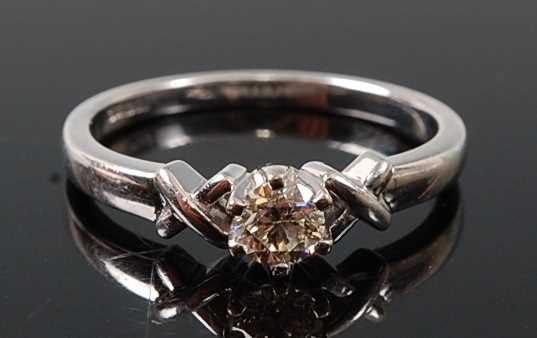 Lot 2608 - An 18ct white gold diamond single stone ring,...