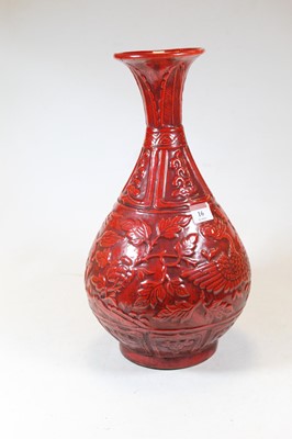 Lot 16 - A modern Chinese red glazed porcelain vase,...