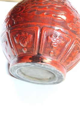 Lot 16 - A modern Chinese red glazed porcelain vase,...