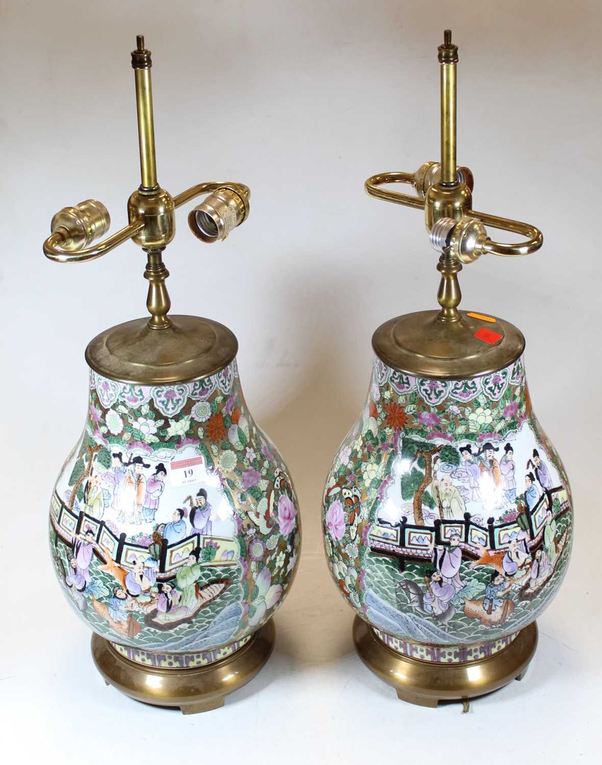 Lot 19 - A pair of Chinese brass mounted table lamps,...