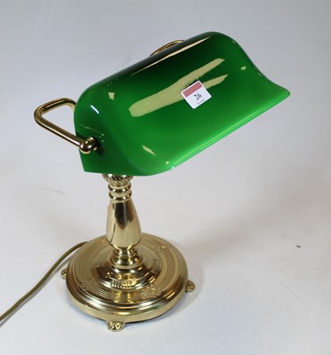 Lot 26 - A modern lacquered brass desk lamp, having an...