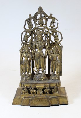 Lot 27 - A Tibetan style gilt bronze figure group, in...
