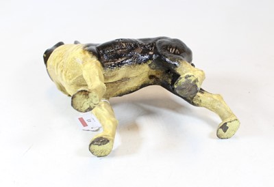Lot 41 - A painted cast iron doorstop in the form of a...