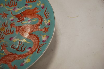 Lot 46 - A Chinese stoneware charger, on a turquoise...