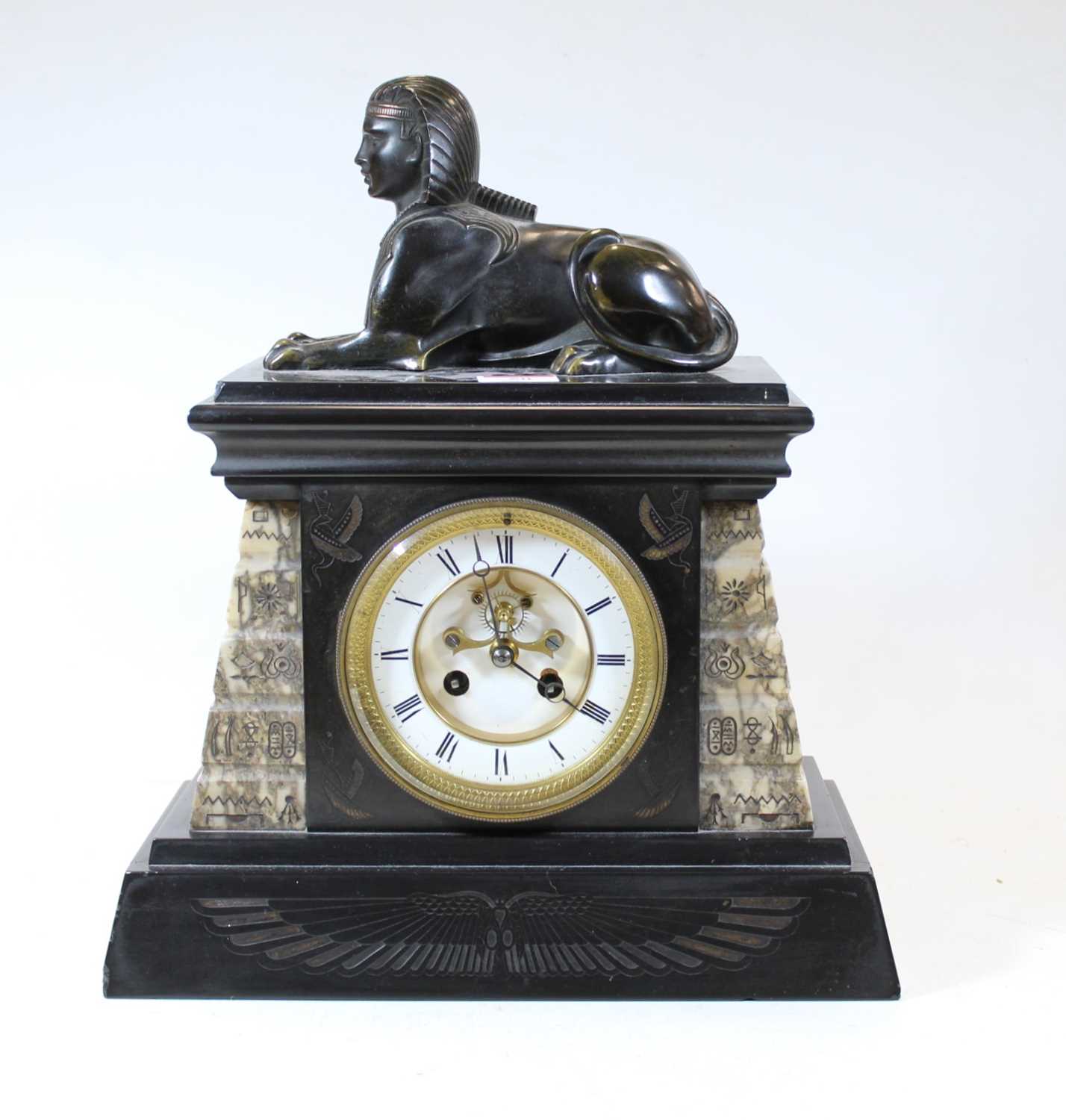 Lot 50 - A late Victorian black slate mantel clock,...