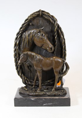 Lot 63 - A modern bronze figure group of a horse and...