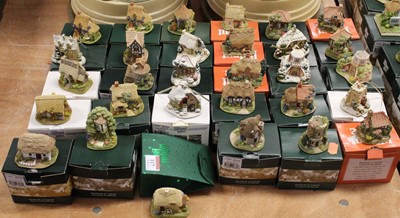 Lot 117 - A collection of 30 boxed Lilliput Lane cottage...