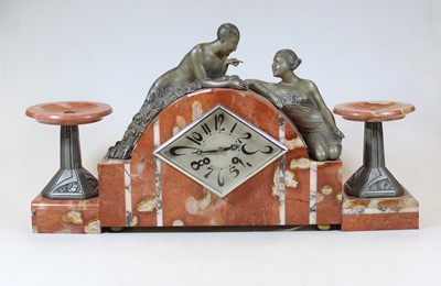 Lot 139 - An Art Deco rouge and veined marble clock...