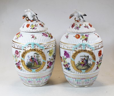 Lot 155 - A pair of continental porcelain vases and...
