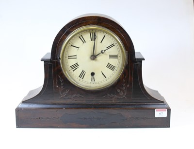 Lot 67 - A late Victorian simulated walnut mantel clock,...