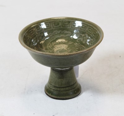Lot 206 - A Chinese export celadon glazed stem cup, the...