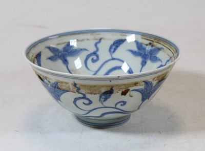 Lot 230 - A Chinese export blue and white rice bowl,...