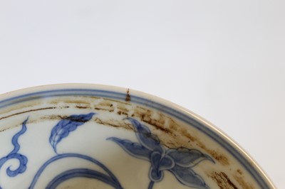 Lot 230 - A Chinese export blue and white rice bowl,...