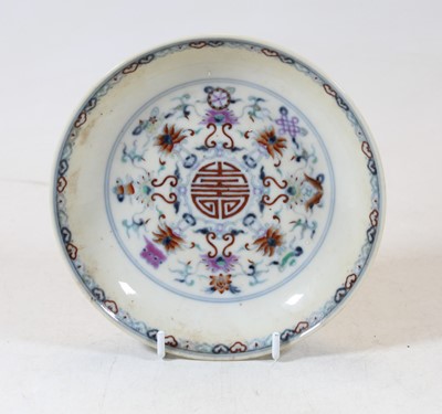 Lot 255 - A Chinese export porcelain shallow bowl, the...
