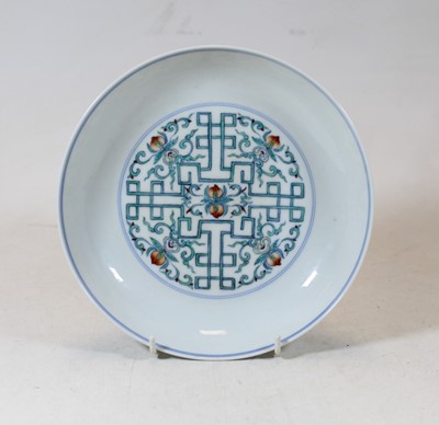 Lot 253 - A Chinese export porcelain shallow bowl, the...