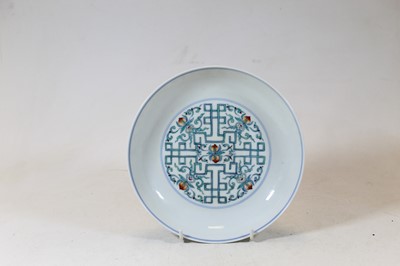 Lot 234 - A Chinese export porcelain shallow bowl, the...