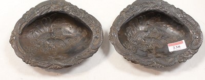 Lot 238 - A pair of copper bowls, the centres each...