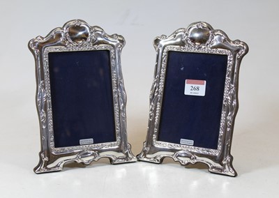 Lot 268 - A pair of modern silver clad easel photo...
