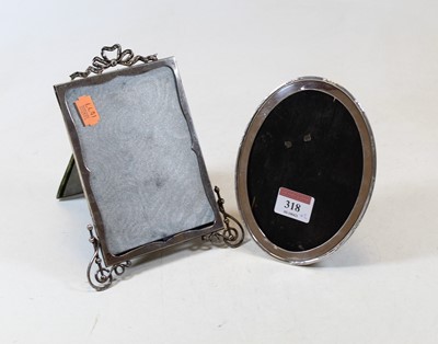 Lot 318 - A late Victorian silver clad easel photograph...