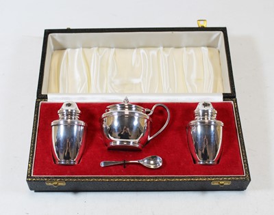 Lot 324 - An Elizabeth II silver three-piece cruet,...