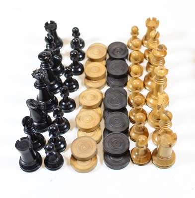 Lot 329 - A turned boxwood and ebony chess set in the...