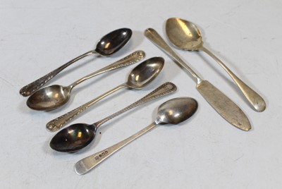 Lot 332 - A matched set of four silver teaspoons;...