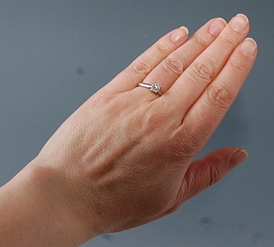 Lot 2631 - A white metal diamond single stone ring,...