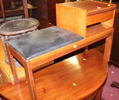 Lot 1412 - A 1930s teak telephone seat with vinyl inset,...