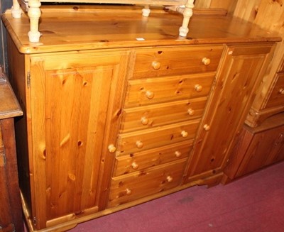 Lot 1462 - A modern pine round cornered side cupboard,...