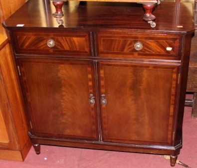 Lot 1477 - A reproduction mahogany low double door side...
