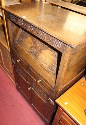 Lot 1483 - A contemporary joined and relief carved oak...