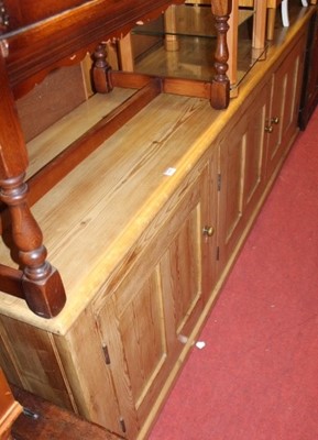 Lot 1489 - A large Victorian pine long side cupboard,...