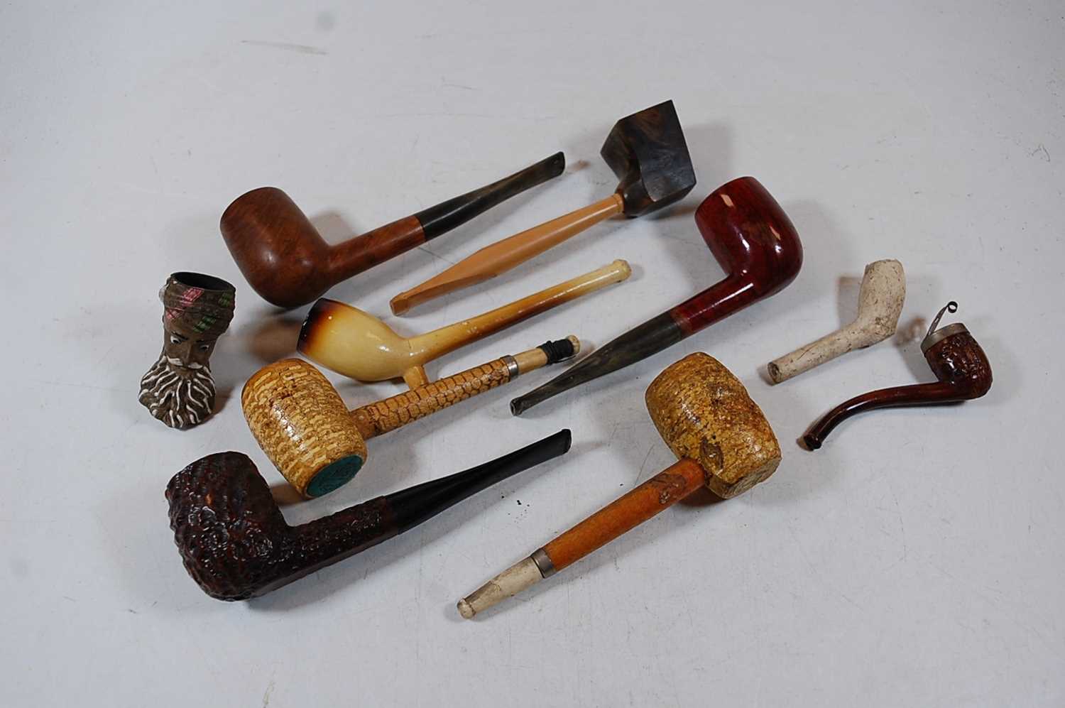 Lot 445 - A collection of assorted smoking pipes, to...