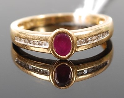 Lot 355 - An 18ct gold, ruby and diamond point set dress...