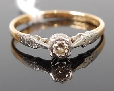 Lot 358 - An 18ct gold diamond solitaire ring, the round...