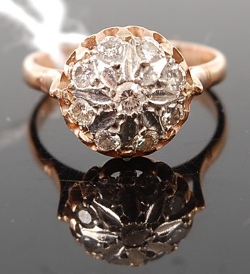 Lot 378 - A yellow metal diamond set cluster ring, the...