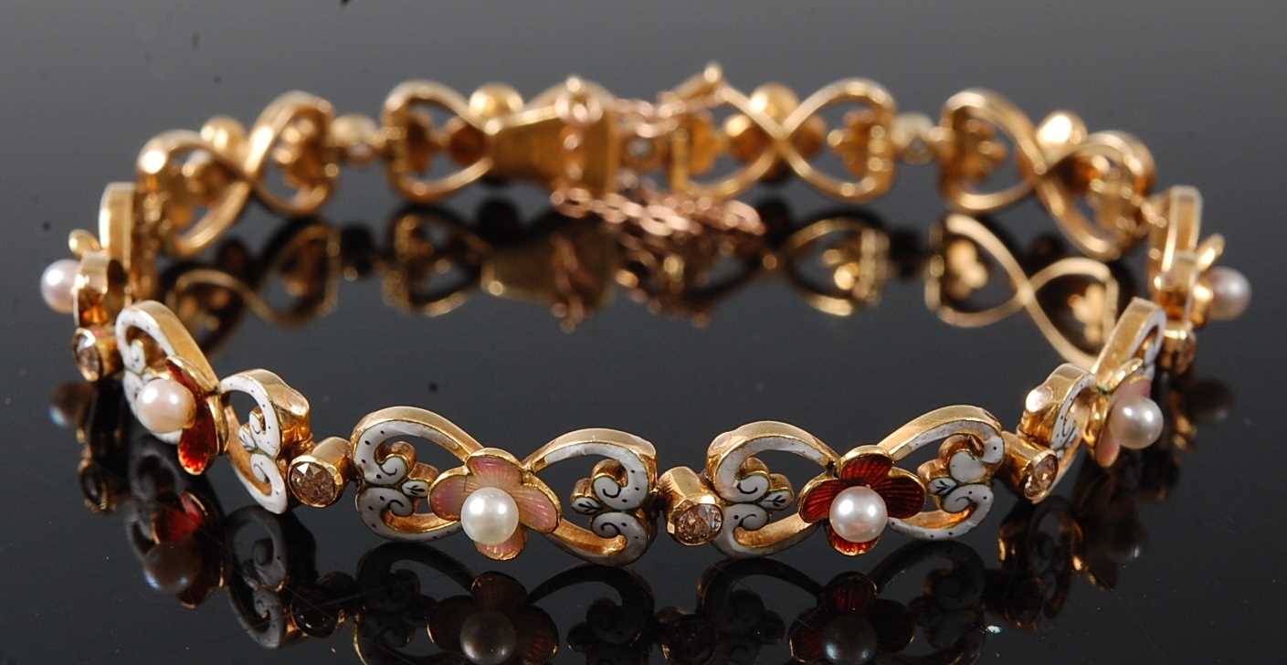 Lot 2664 - A yellow metal, pearl and diamond bracelet,...